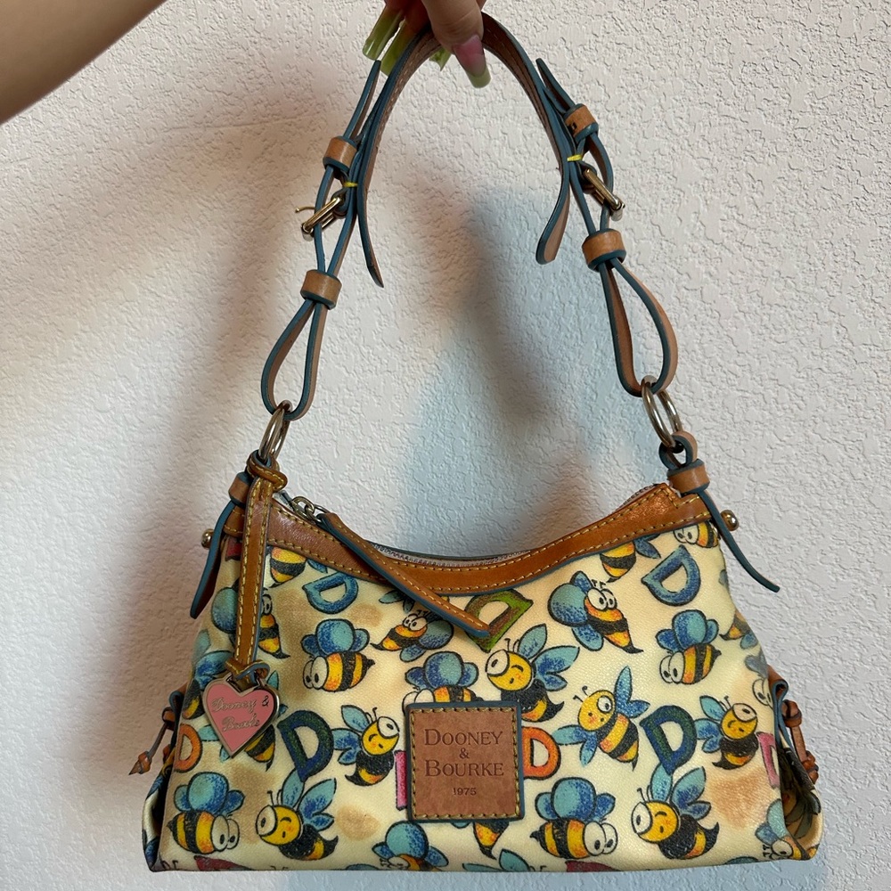 Dooney & Bourke Cream and Blue Bee Mini Bag